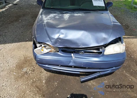 1999 Toyota Corolla Le z USA, uszkodzony, nr VIN 2T1BR12E8XC109982